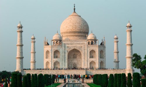 A stunning shot of the Taj Mahal in Agra, showcasing its iconic architecture and serene surroundings.